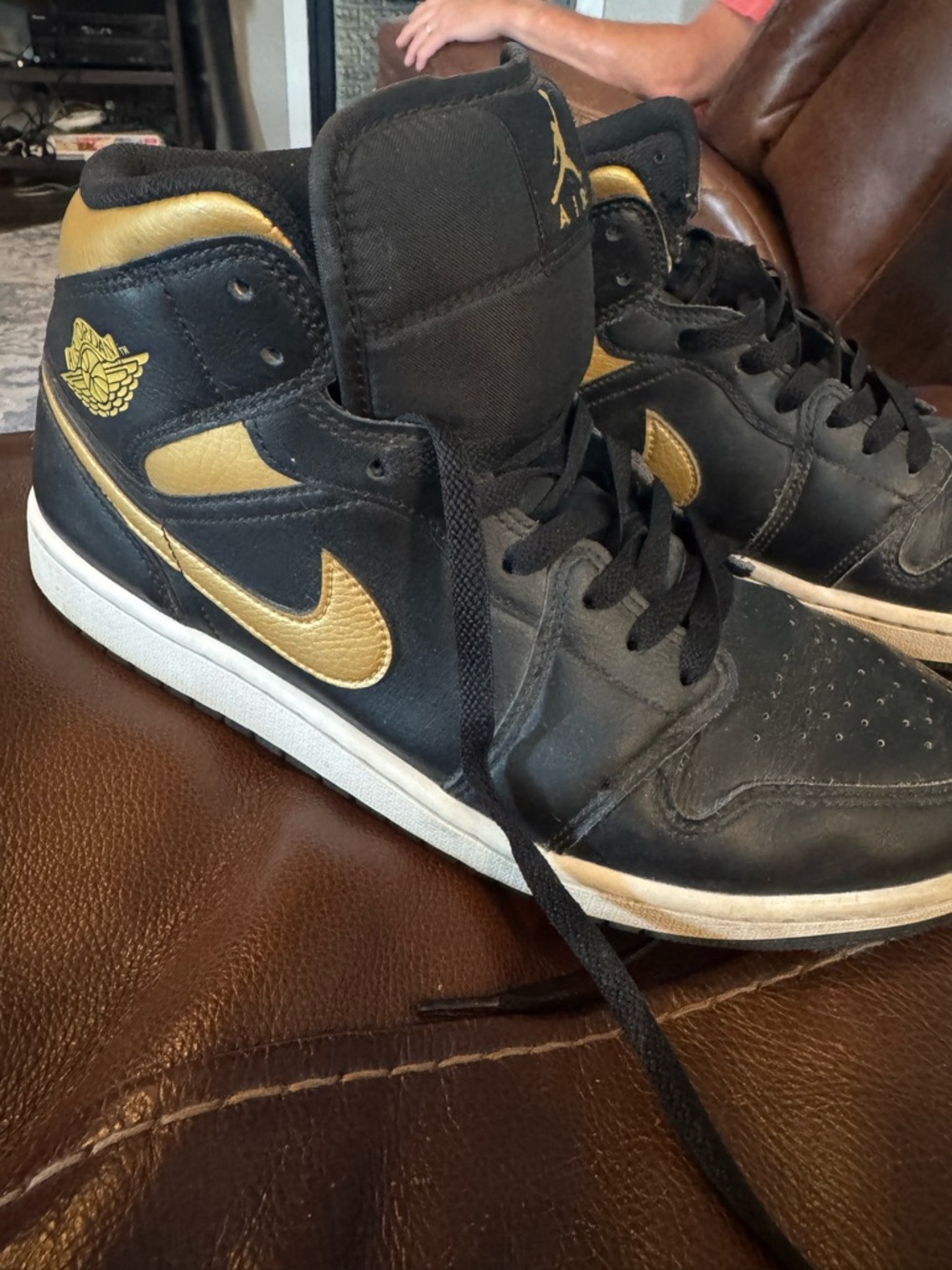 Jordan High-Top Sneakers in Black & Gold